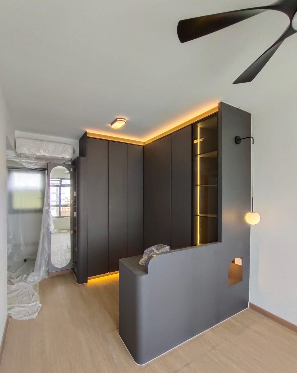 Bedroom — lit display and curved partition
