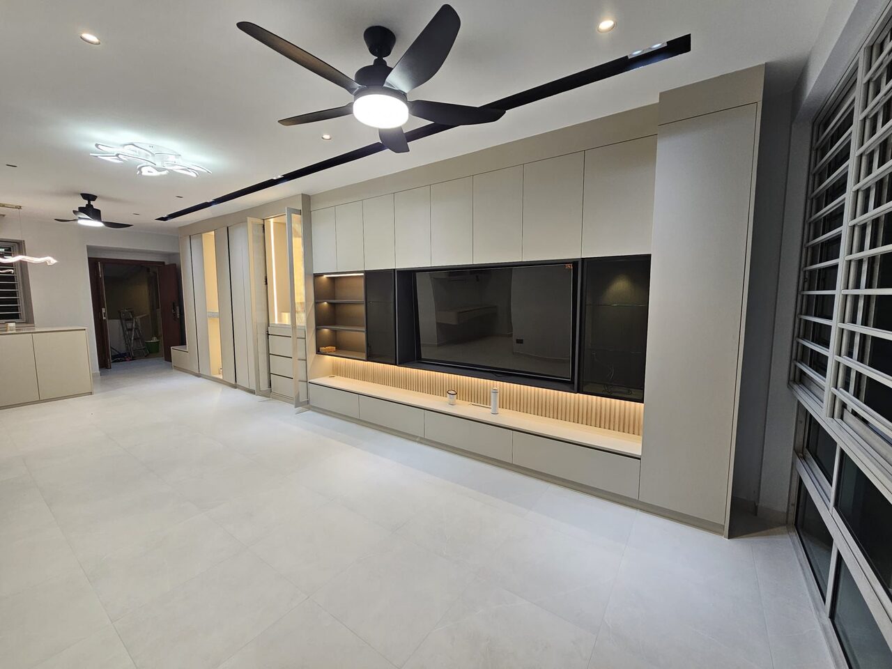Living — TV feature wall and open-plan