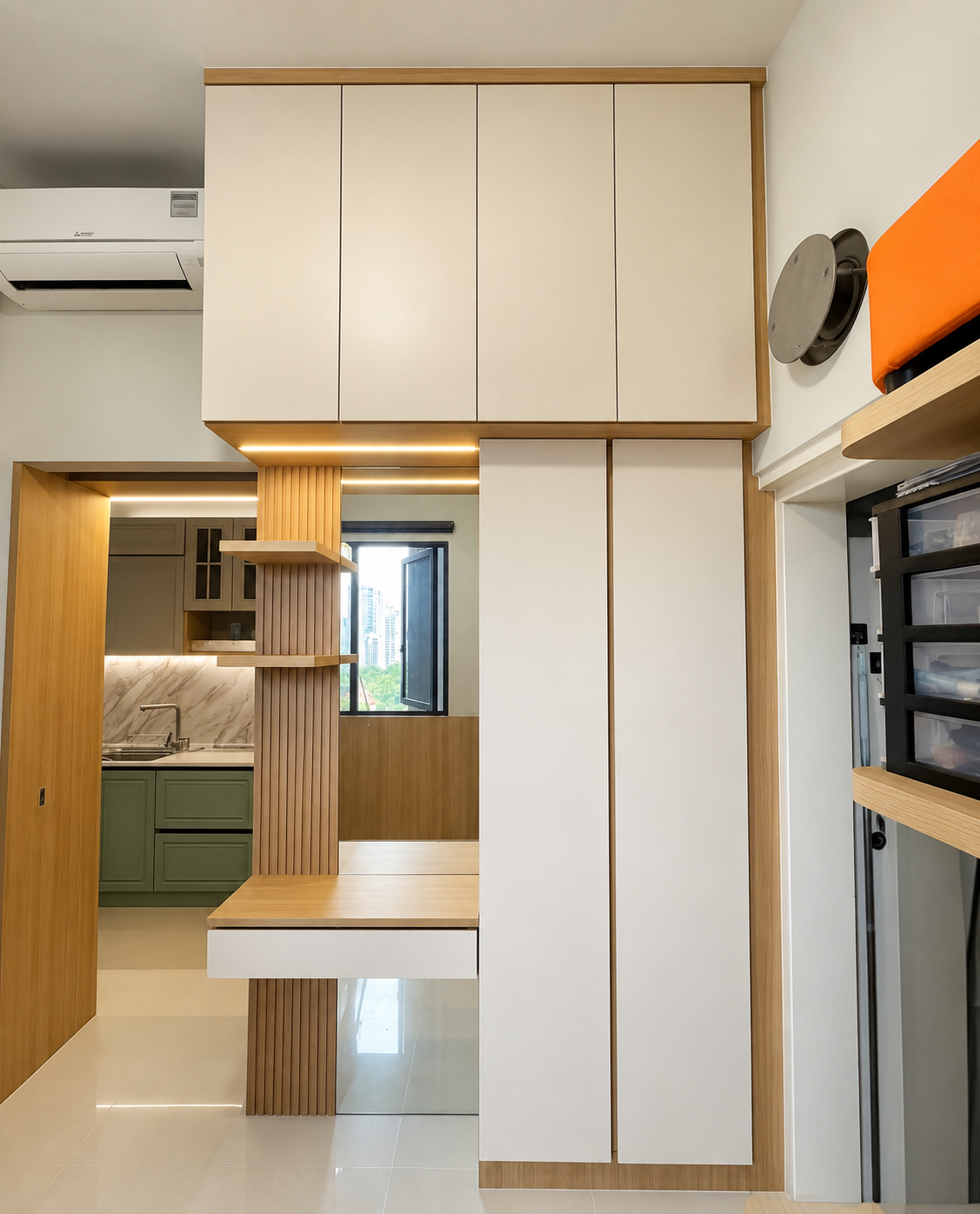 Entryway and kitchen overview — cream cabs, oak fluted column, green shaker kitchen
