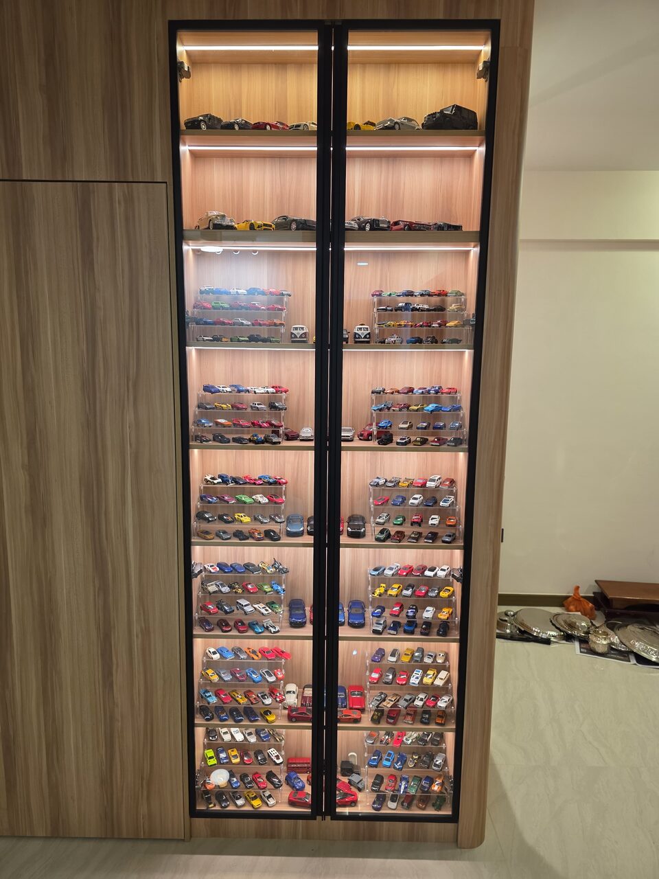 Circuit Road HDB home — die-cast car display wall